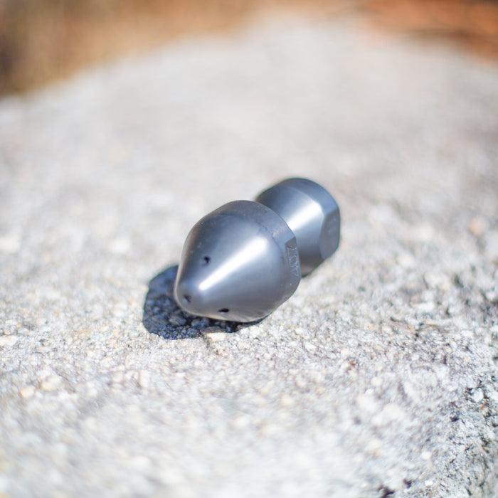 US Jetting RPD Egghead Penetrator nozzle made of case‑hardened steel, shown with rounded nose and two‑piece removable cap for easy cleaning, featuring forward and rear jet ports for penetrating blockages, heavy grease, and root masses; high‑pressure sewer jetting nozzle rated for 14–65 GPM and 2,000–10,000 PSI, compatible with 1/2", 3/4", and 1" hoses.