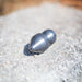 US Jetting RPD Egghead Penetrator nozzle made of case‑hardened steel, shown with rounded nose and two‑piece removable cap for easy cleaning, featuring forward and rear jet ports for penetrating blockages, heavy grease, and root masses; high‑pressure sewer jetting nozzle rated for 14–65 GPM and 2,000–10,000 PSI, compatible with 1/2", 3/4", and 1" hoses.