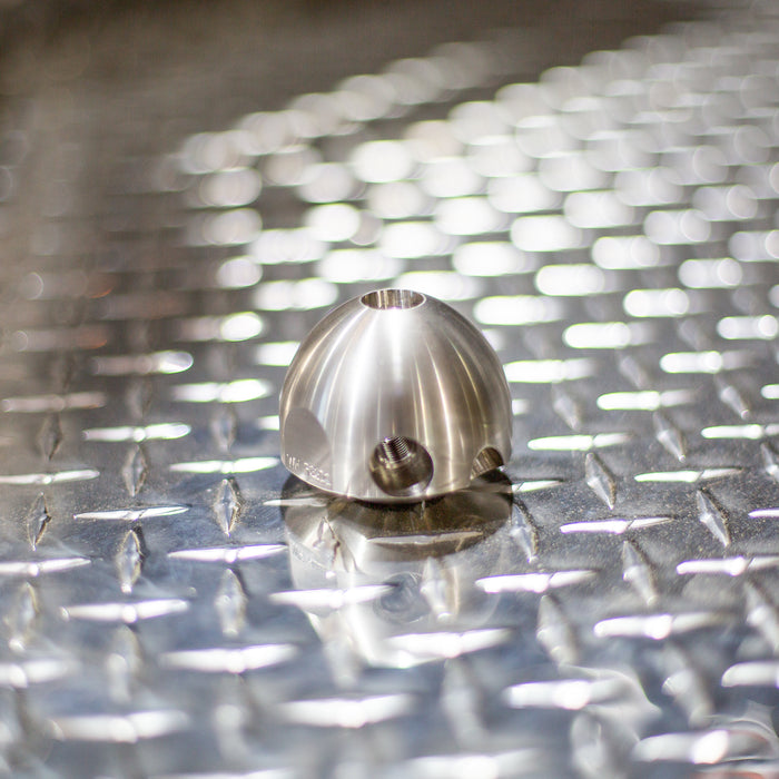 Stainless steel Warthog descaling head for 1/2‑inch and 3/4‑inch WH Classic sewer jetting nozzles, featuring dual 105‑degree rear jets and optional plugged front port for maximum scale removal, tuberculation cleaning, and mineral buildup removal on high‑pressure jetting tools.